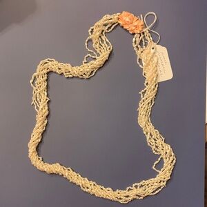 Elegant Fresh Water Pearl Necklace with Coral Floral Clasp